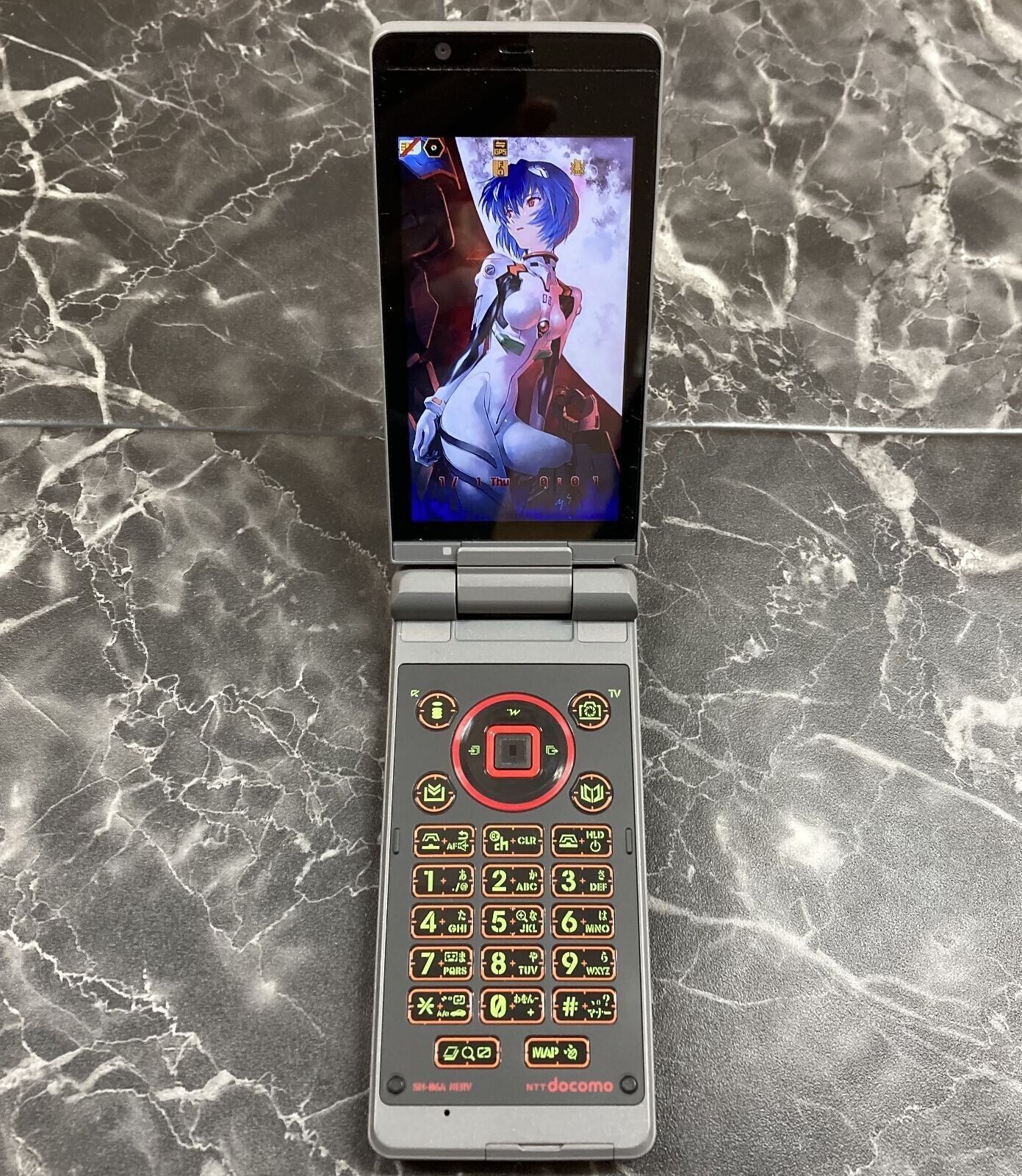 SHARP SH-06A NERV Evangelion collaboration Cell Phone w/accessories Used