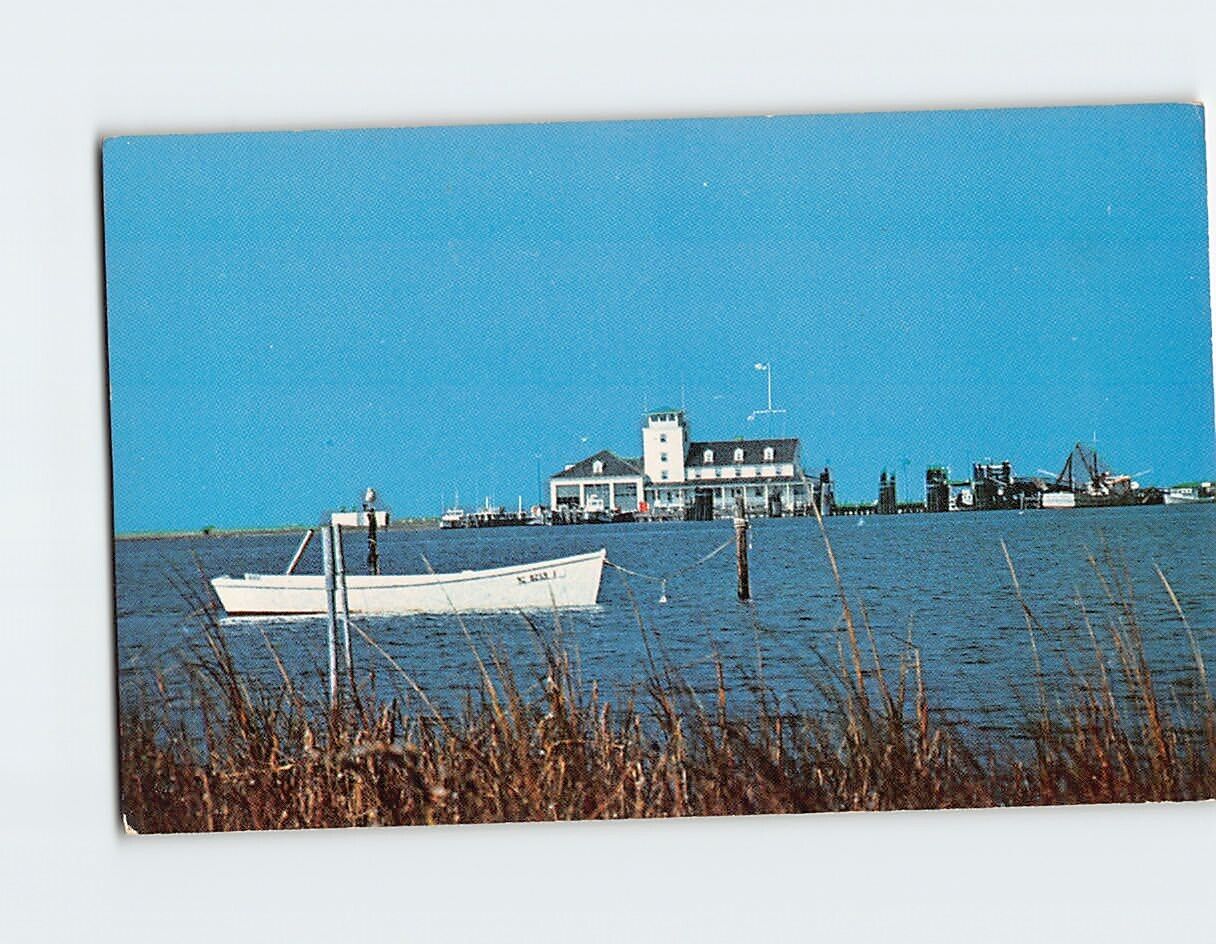 Postcard A lonely boat on Ocracoke Island Ocracoke North Carolina USA
