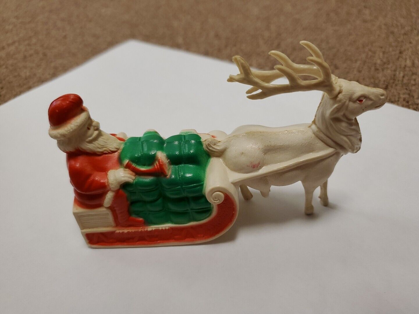 Vintage 1930’s Small Celluloid Santa On Sleigh w/ Reindeer, has Damage