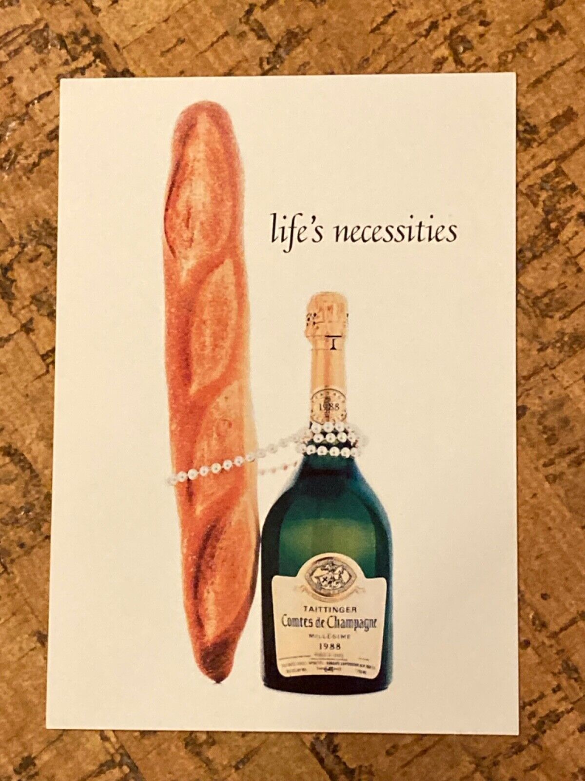 Postcard Taittinger\'s Comtes de Champagne life\'s necessities French bread pearls