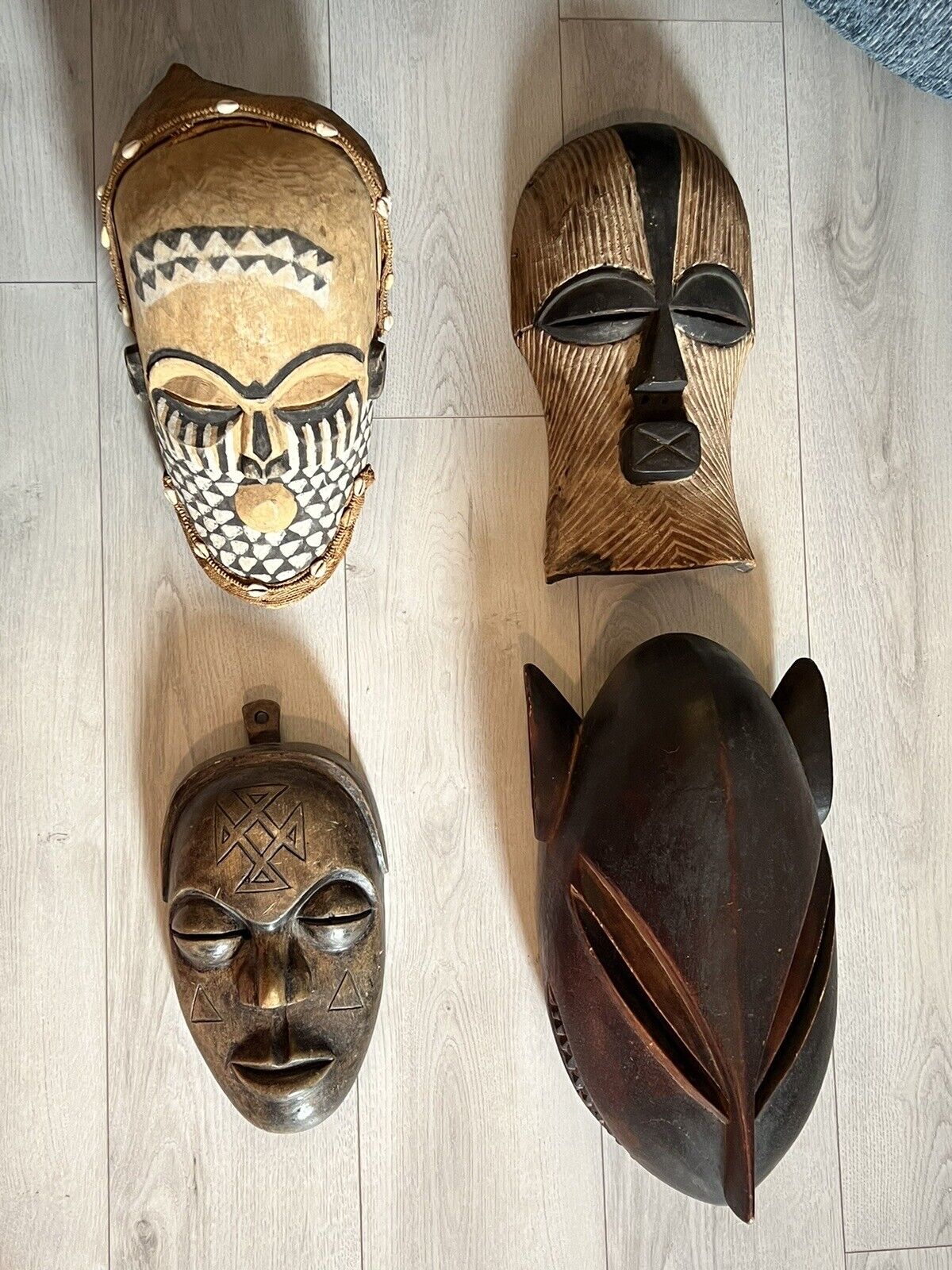 Four vintage African wooden mask