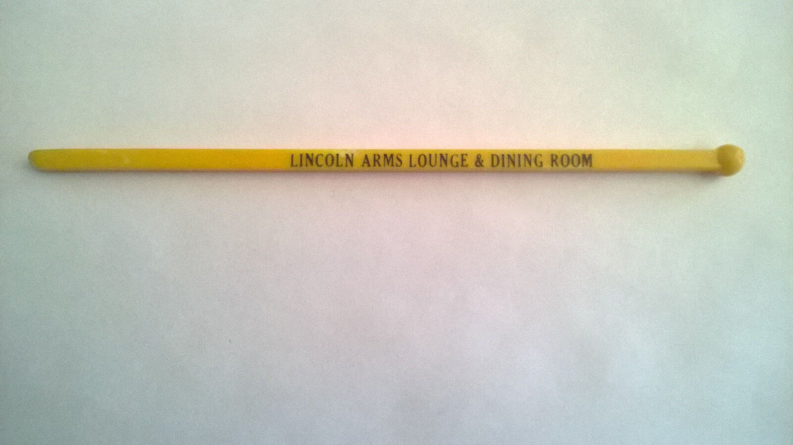 Lincoln Arms Lounge & Dining Room Swizzle Stick Drink Stirrer Yellow Plastic