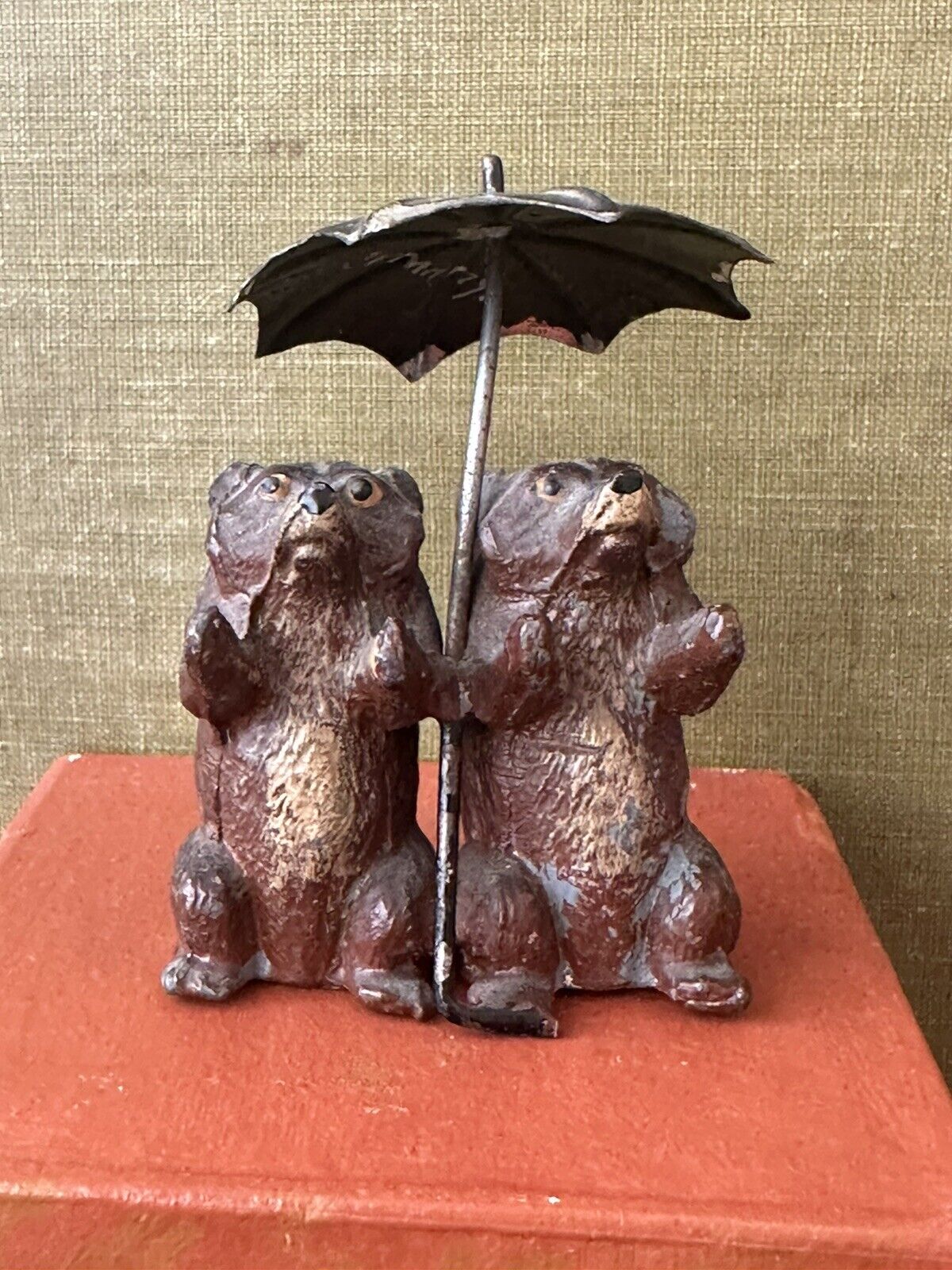 Vintage 1930s painted pot metal bears with umbrella figurine made In Germany