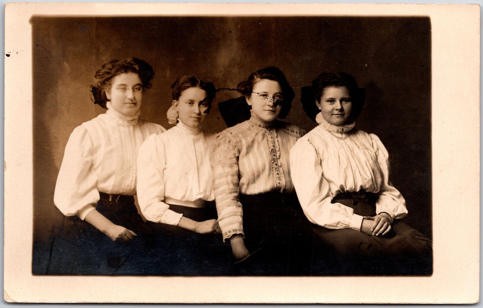 Four Sisters Wearing White Sleeves Well-Groomed Hair Real Photo RPPC Postcard