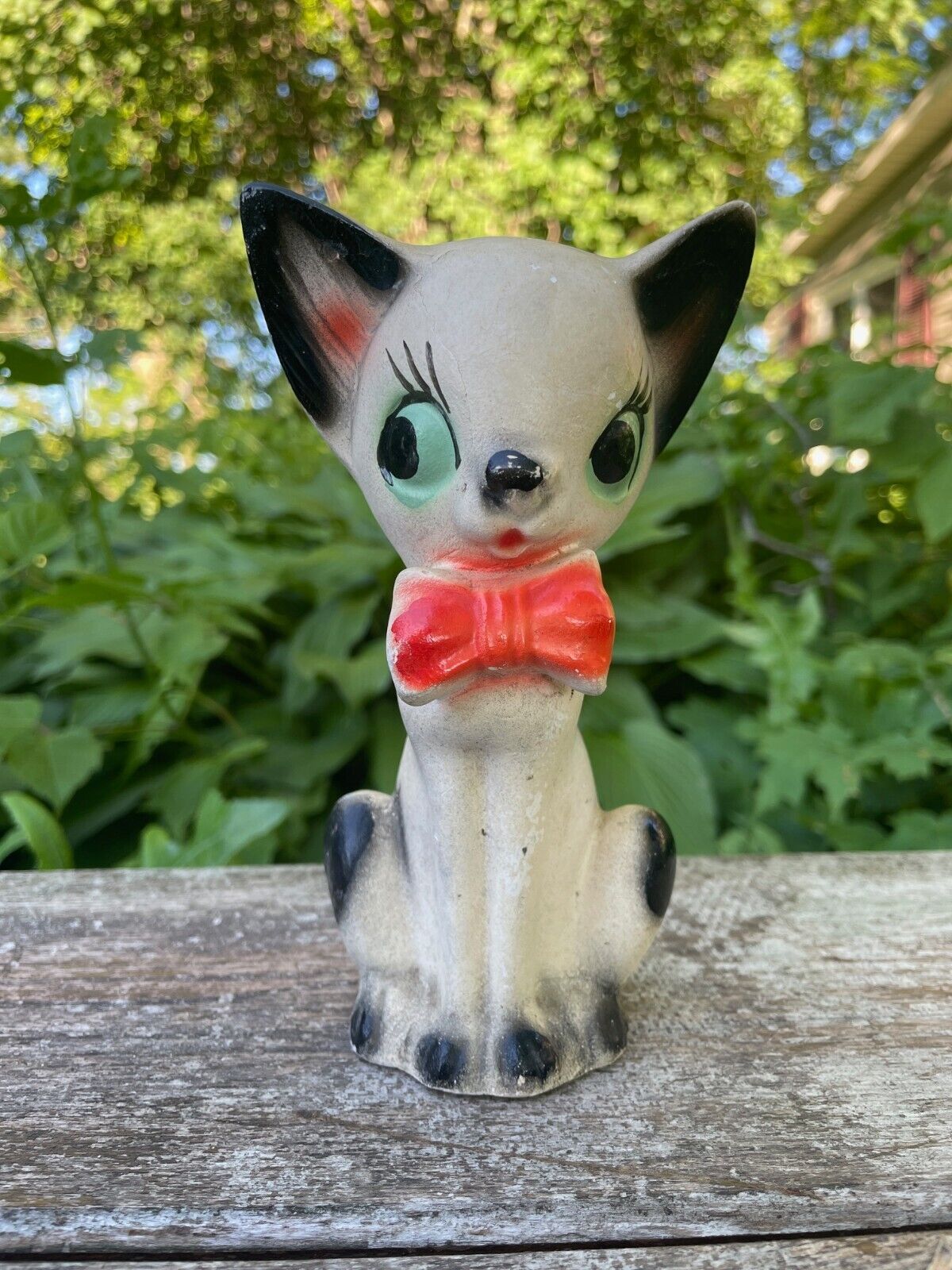 Vintage Chalkware - Shifty-Eyed Cat Wearing a Red Bow Tie and Grinning