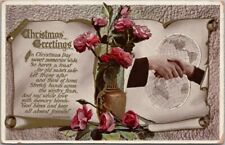 1910s Tuck's CHRISTMAS GREETINGS Gel Postcard Man & Woman's Hands / Pink Roses picture