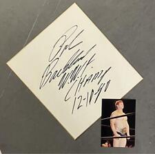 Bob Backlund autographed colored paper with photo of WWF World Heavyweight Belt picture