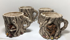 Four cute ceramic hot chocolate coffee mugs picture