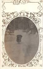 VINTAGE POSTCARD REAL PHOTO OBJECT IN SNOWY FOREST ON 
